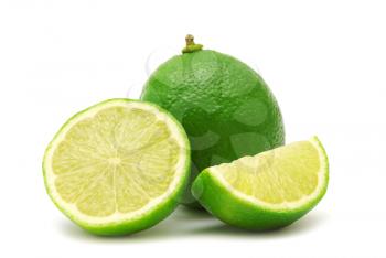 Fresh limes isolated on white