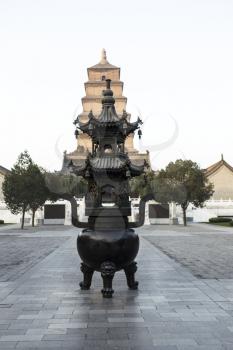 Large Chinese Censer in front of Temple in Xian China with blue sky in background