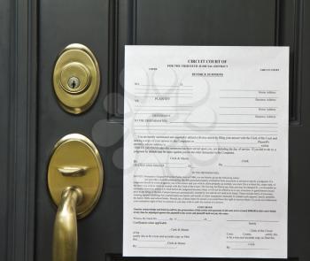 Official divorce summons posted on front door