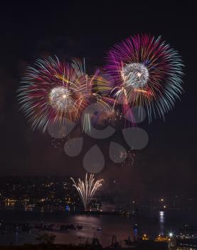 Fireworks off lake union in Seattle Washington late summer night
