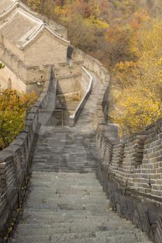 Downward large staircase leading to big building on the Great Wall in China