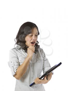 Asian women wearing business causal clothing and yawning on white background