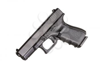 Modern compact pistol on white background