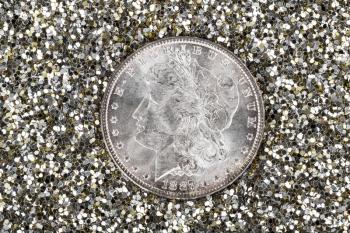 High Quality American Silver Dollar in Gold and Silver glitter background