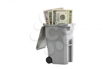 Trash bin with United States currency on white background