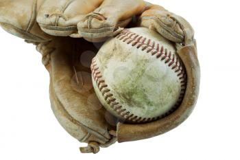 Closeup horizontal photo of an old dirty baseball inside of a heavily used glove isolated on white  
