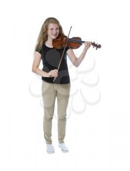 Full body front view of a pretty young teenage girl playing violin isolated on white