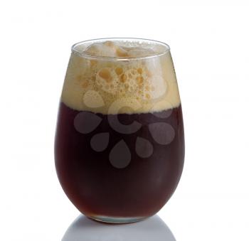 Fresh dark beer in stemless glass goblet on white with reflection
