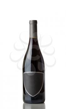 Unopened Red Wine Bottle with label isolated over white background with reflection 