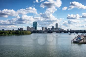 Boston, Massachusetts, skyline on the water during summer time