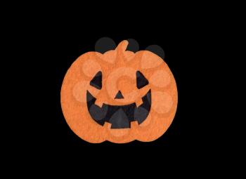 Bright pumpkin decoration isolated on black