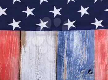 Stars on rustic painted boards in national colors of United States of America. 