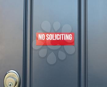 No soliciting sign on front door of home