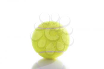 Tennis ball isolated on white background with reflection 