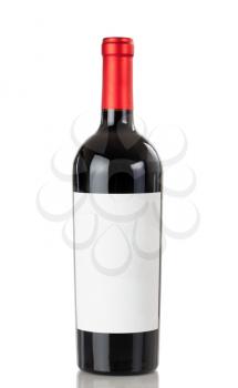 Full bottle of red wine isolated on a white background with reflection 