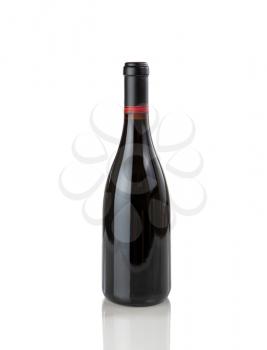 Red wine bottle isolated on pure white background with reflection 