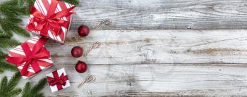 Merry Christmas holiday border on white weathered wooden background for the season  