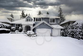 Residential home located in Pacific Northwest of United States after snow storm