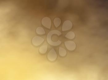 Cloudy bright gold colors making an abstract background texture in full frame format 