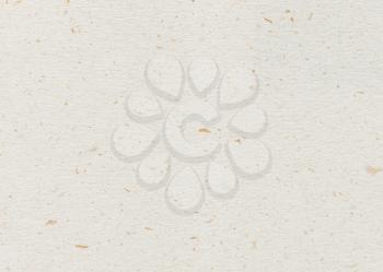 Blank light ocher hand-made textured paper with particles for design-use
