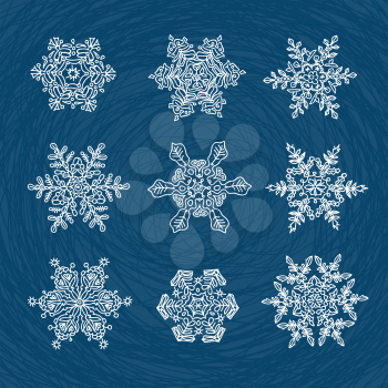 Macro-structure of real snowflakes, transformed and drawn as ornamental usable shapes. Set of nine forms.