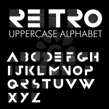 Wide decorative retro alphabet. White letters on black background