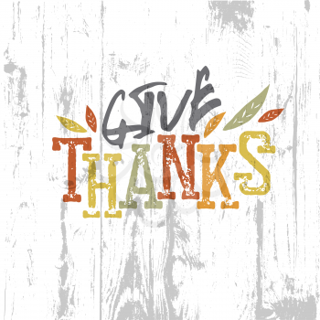 Happy Thanksgiving design. Give Thanks Logo. For holiday greeting cards designs. On wooden texture background