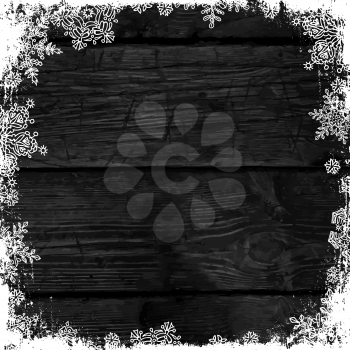 Wooden black christmas background with snowflakes. Frozen ornament on isolated frame. Holiday Postcard template