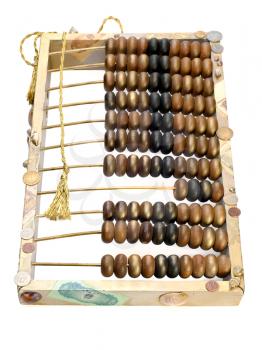 abstract composition from the old abacus, coins and shells isolated on white background