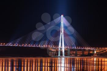 night view of the longest cable-stayed bridge in the world in the Russian Vladivostok over the Eastern Bosphorus strait to the Russky Island