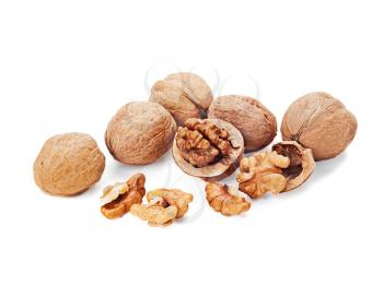 walnuts and a cracked walnut isolated on the white background