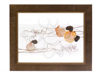 decorative photo frame with abstract composition of shells, stones and wire isolated on white background
