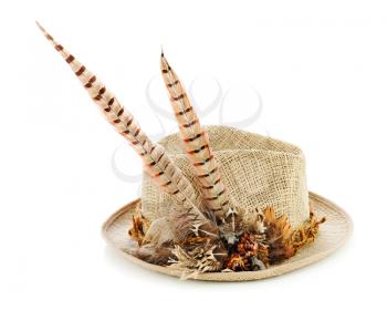 Hunting hat with pheasant feathers isolated on white. Closeup.