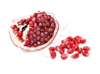 Part of pomegranate fruit isolated on white background. Closeup.