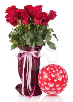 Bouquet from red roses in vase and balloon isolated on white background. Closeup.