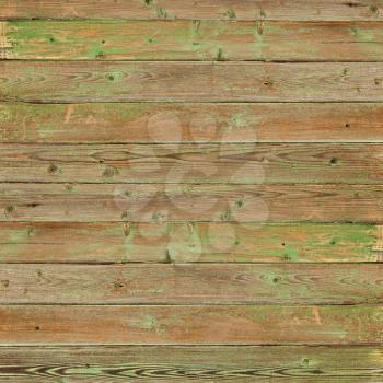 Old greeen wood plank background. Closeup.