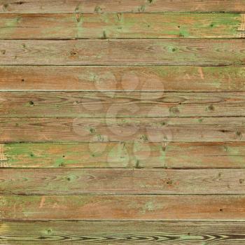 Old greeen wood plank background. Closeup.