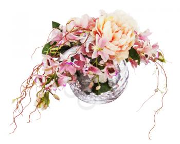 Bouquet from peon flowers and orchids in glass vase isolated on white background. Closeup.