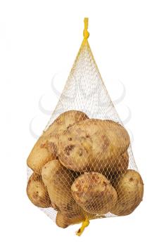 Crude, rotten, spoiled, unpeeled, organic potatoes in mesh bag isolated on white background. Closeup.