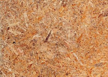 Recycled compressed wood chipboard. Useful for designers as background. Closeup.