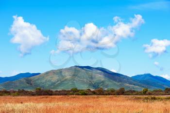Landscape with mountain views, blue sky and beautiful clouds. Real scene without any light effects.