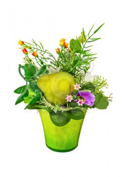 Bouquet from artificial flowers and fruits arrangement centerpiece in vase isolated on white background.