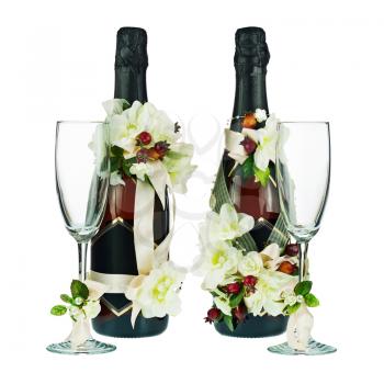 Champagne Bottles and Glass with Wedding Decoration of Flower Arrangements Isolated on White Background.