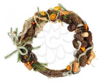 Green Christmas Wreath with Decorations Isolated on White Background. Closeup.