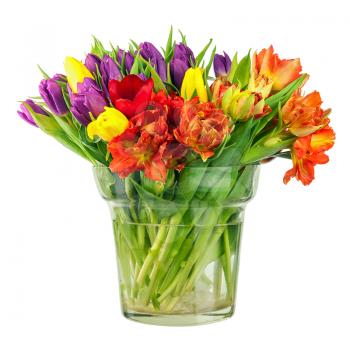Flower bouquet from colorful tulips in glass vase isolated on white background.