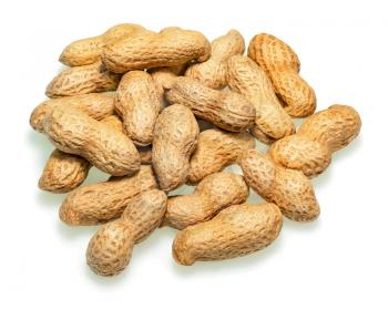 Pile of dry roasted peanuts isolated on white background. Closeup.