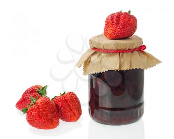 Glass jar of strawberry jam with berries isolated on white background. Closeup.