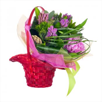 Bouquet of peonies, hyacinths and other flowers in red wicker basket isolated on white background. Closeup.