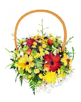 Colorful flower bouquet arrangement centerpiece in wicker gift basket isolated on white background.