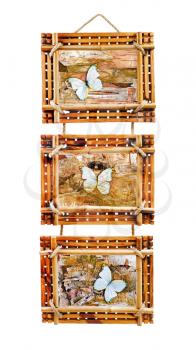 Three bamboo photo frames with abstract composition of butterflies, birch bark and straw isolated on white background